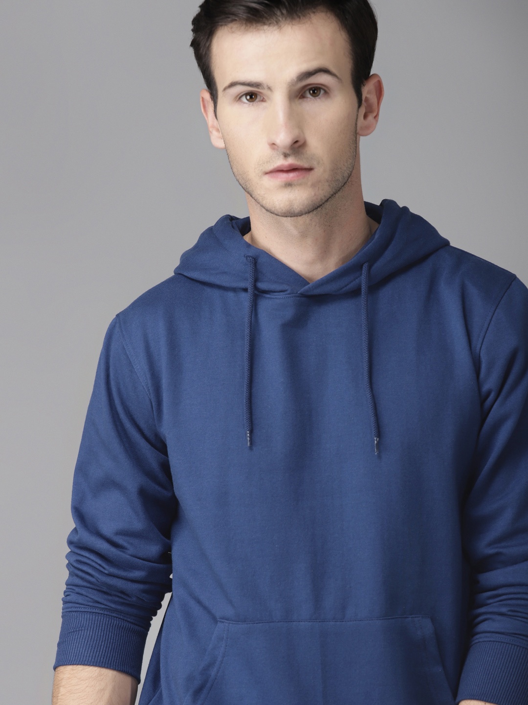 

Roadster Men Blue Solid Hooded Sweatshirt
