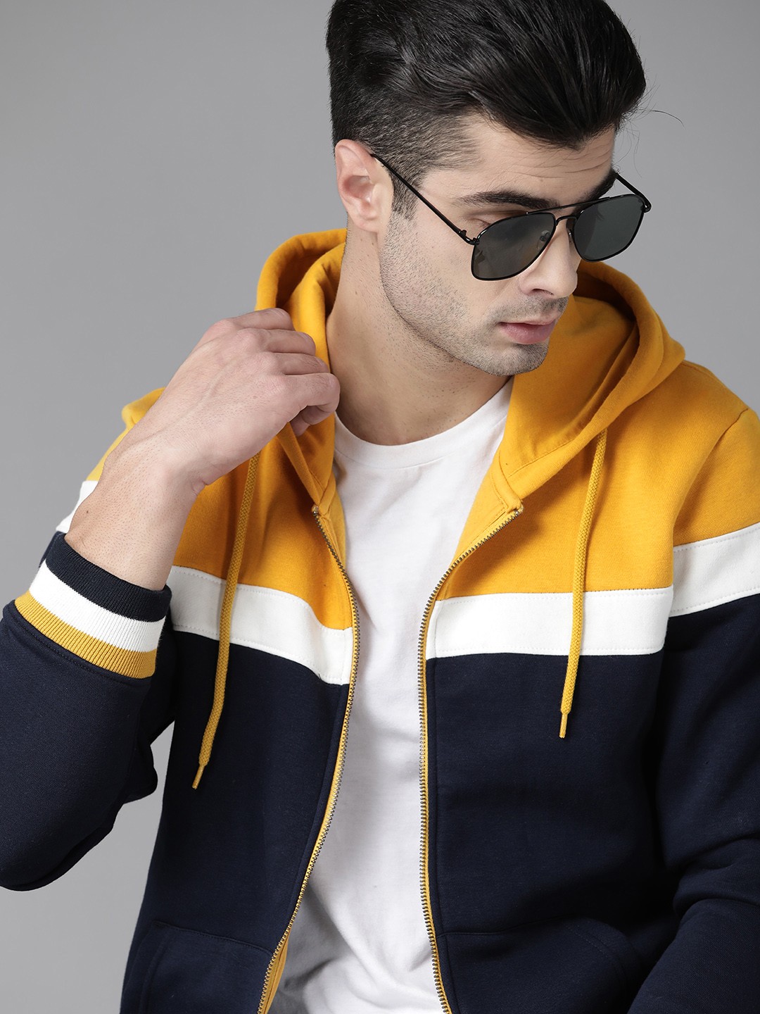 

Roadster Men Navy Blue & Mustard Yellow Colourblocked Hooded Sweatshirt