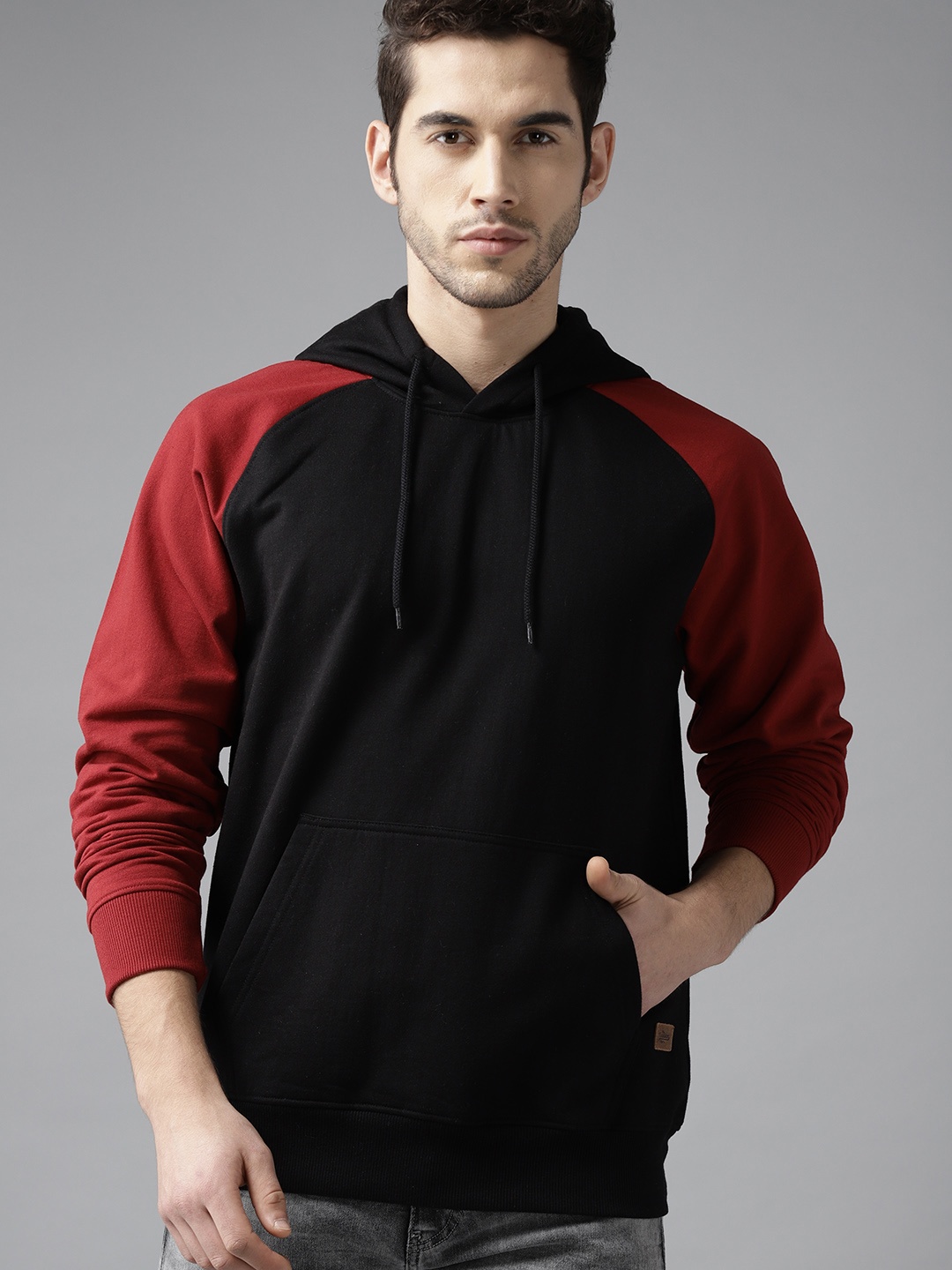 

Roadster Men Black Solid Hooded Sweatshirt