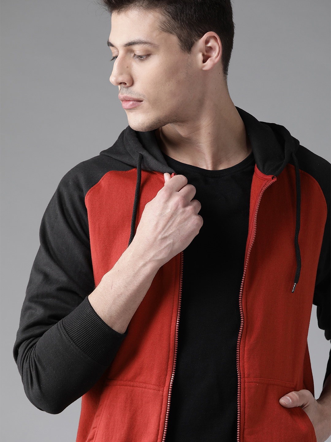 

Roadster Men Red & Black Solid Hooded Sweatshirt