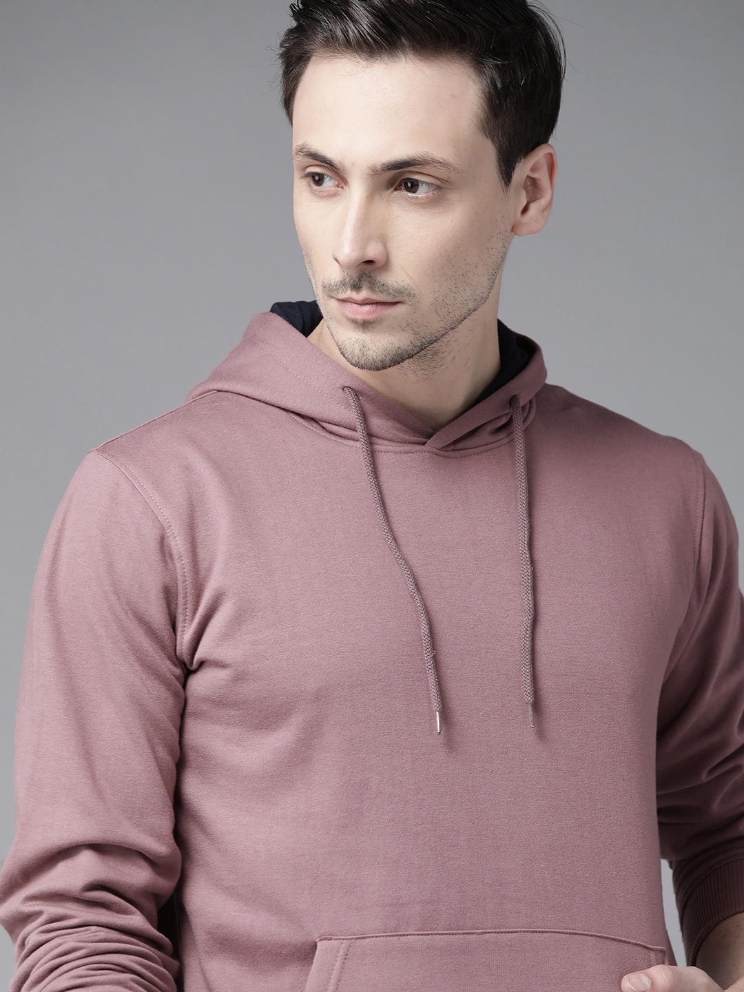 

Roadster Men Mauve Solid Hooded Sweatshirt