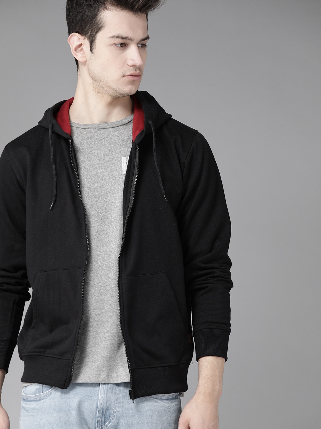 

Roadster Men Black Solid Hooded Sweatshirt