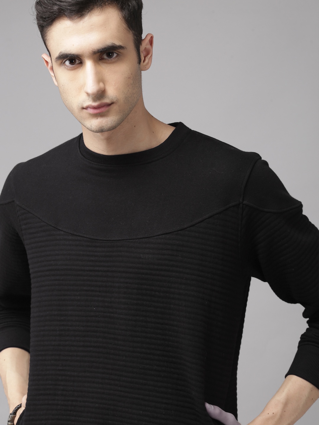 

Roadster Men Black Self Striped Sweatshirt