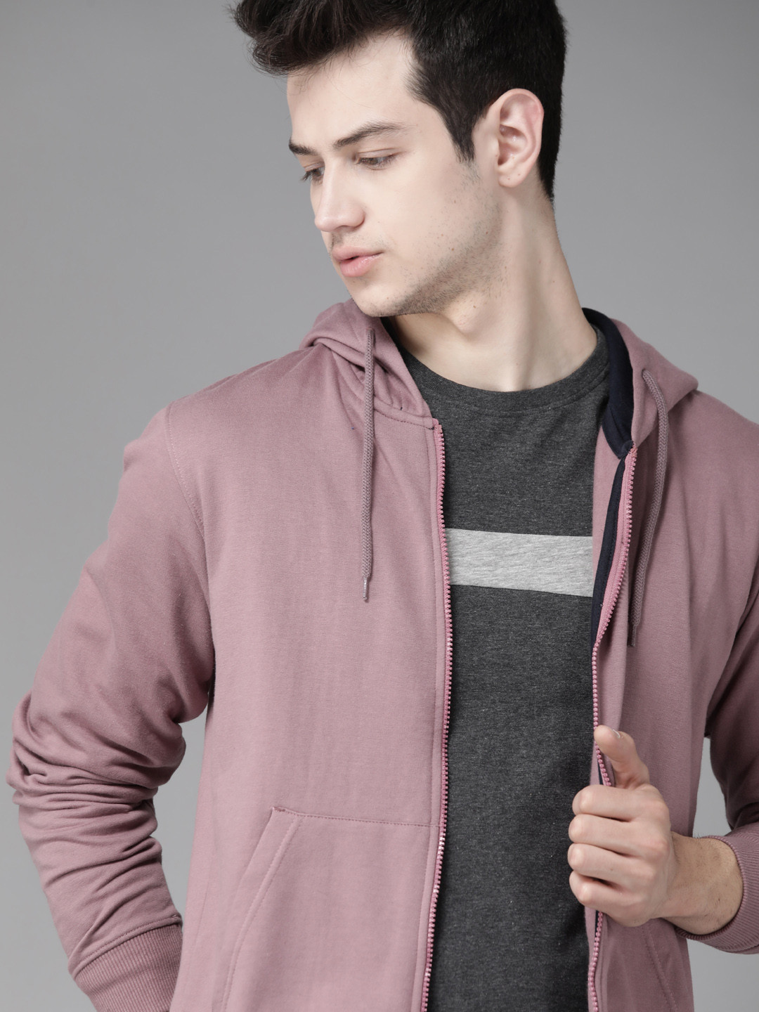 

Roadster Men Mauve Solid Hooded Sweatshirt