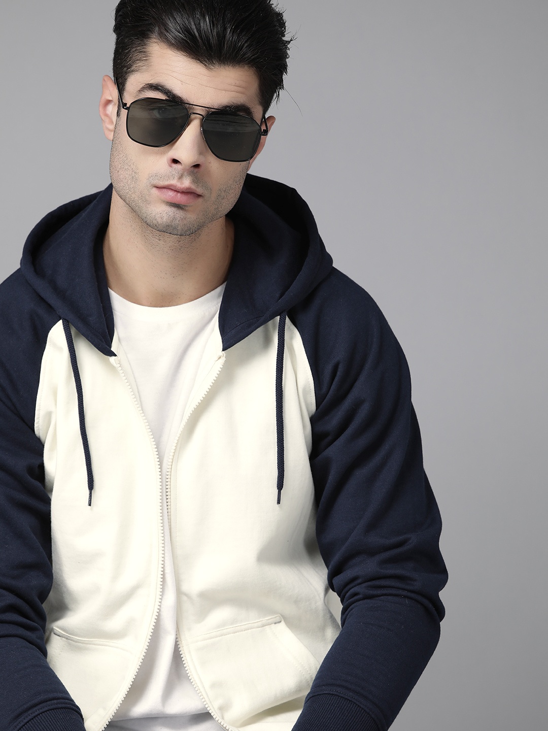 

Roadster Men Off-White & Navy Blue Solid Hooded Sweatshirt