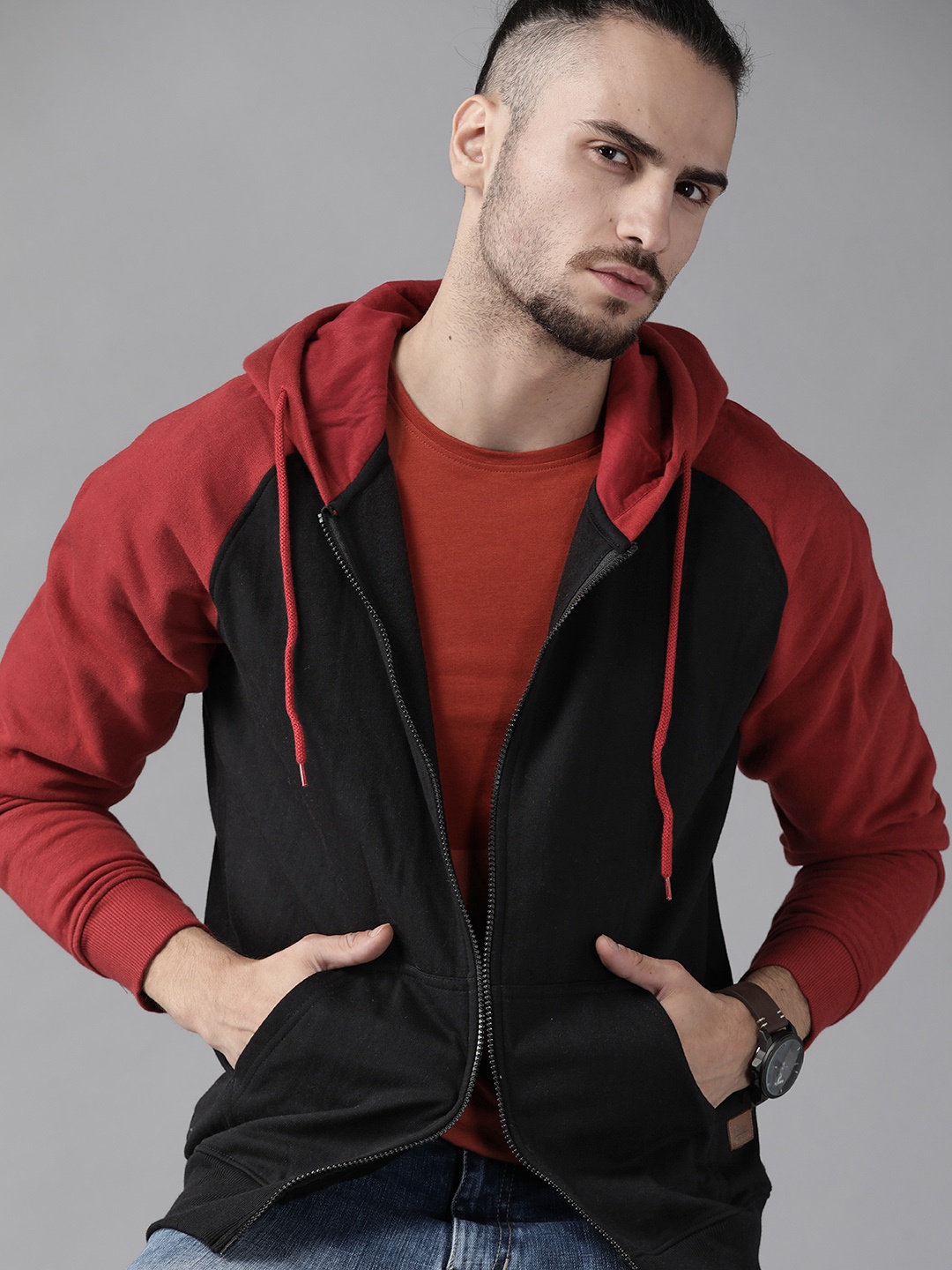 

Roadster Men Black Solid Hooded Sweatshirt
