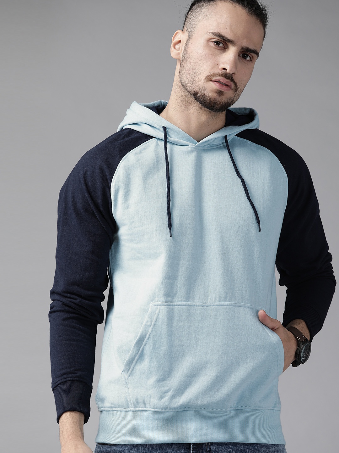 

Roadster Men Blue Solid Hooded Sweatshirt