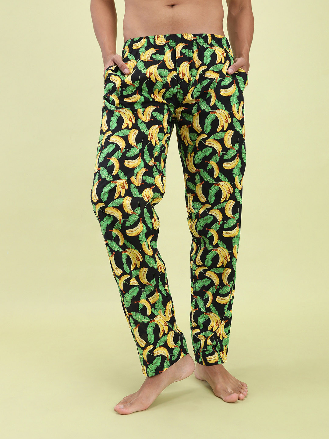 

The Indian Garage Co Men Black & Yellow Tropical Printed Lounge Pants