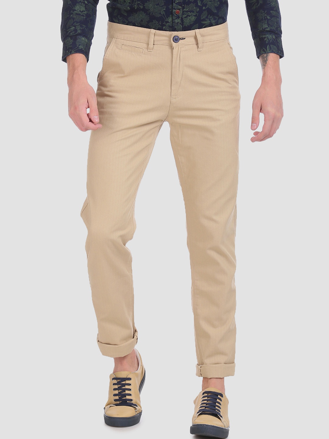 

RUF & TUF Men Beige Slim Fit Solid Regular Trousers