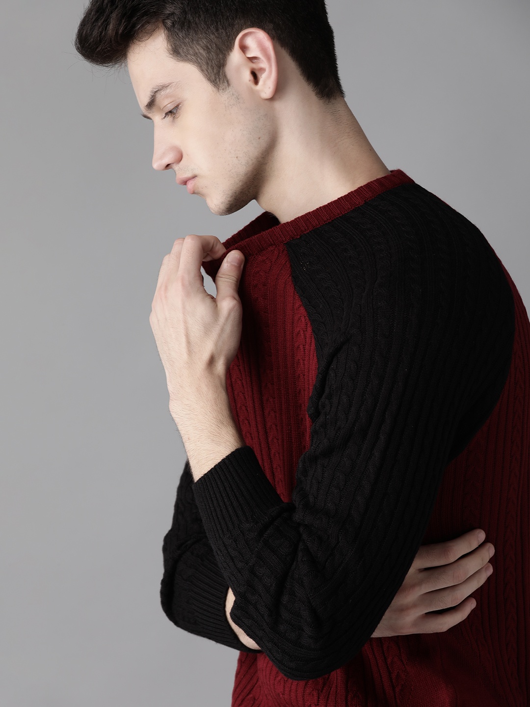 

Roadster Men Maroon Self Design Pullover Sweater