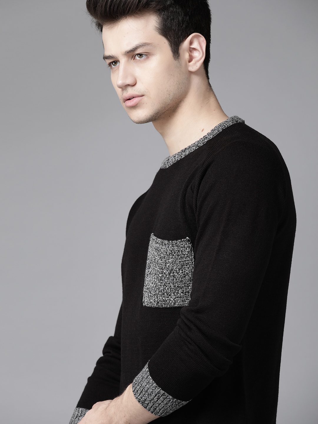 

Roadster Men Black Solid Pocket Detailing Pullover Sweater