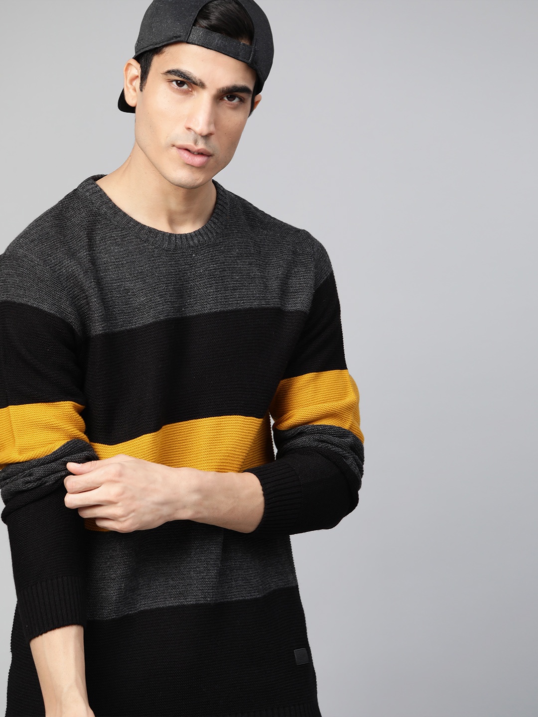 

Roadster Men Black & Mustard Yellow Striped Pullover Sweater