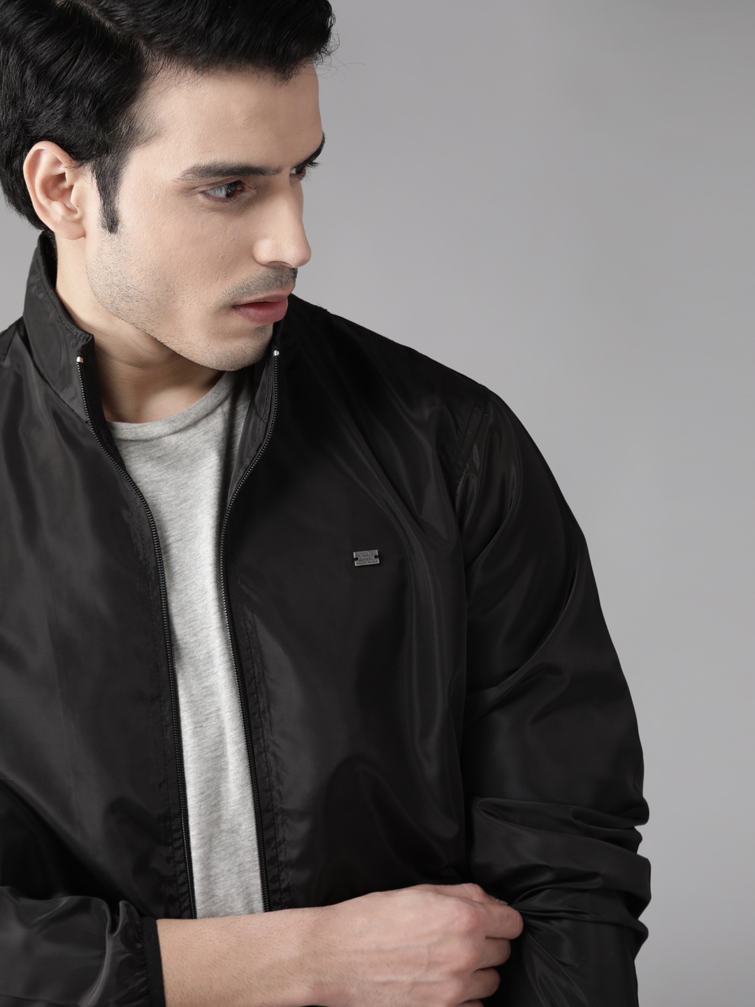 

Roadster Men Black Solid Lightweight Jacket