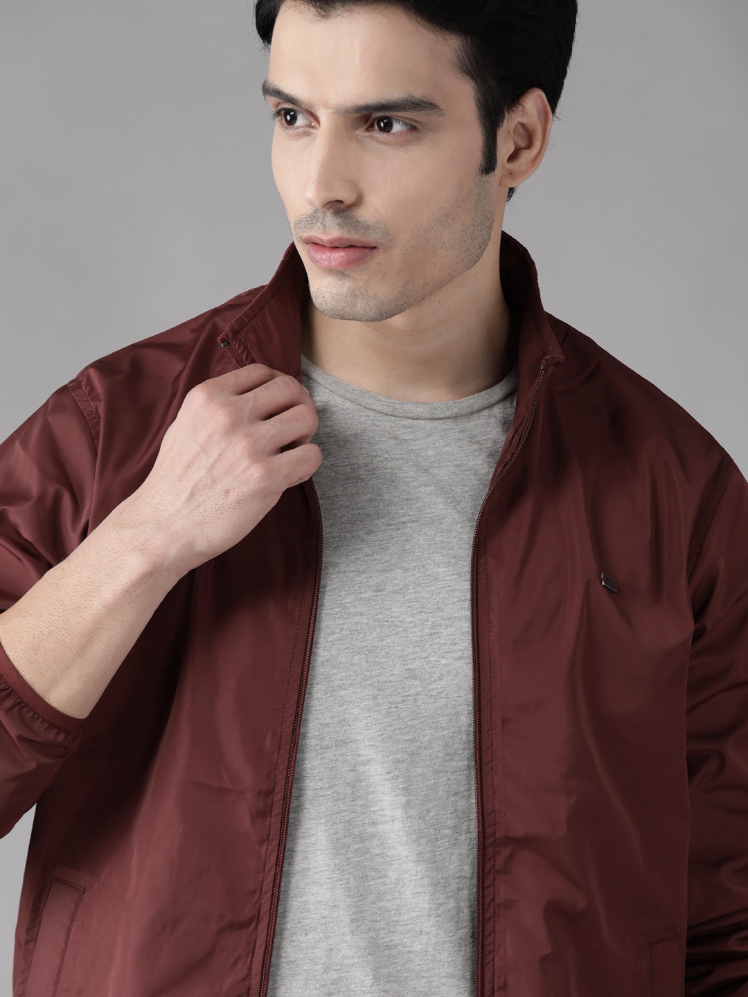 

Roadster Men Burgundy Solid Lightweight Jacket