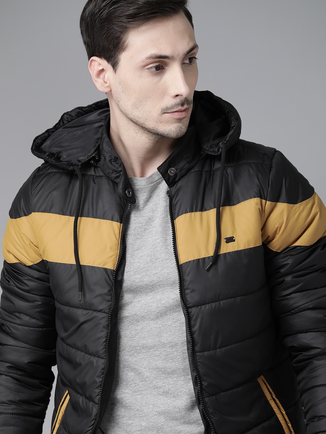 

Roadster Men Black & Mustard Yellow Colourblocked Padded Jacket