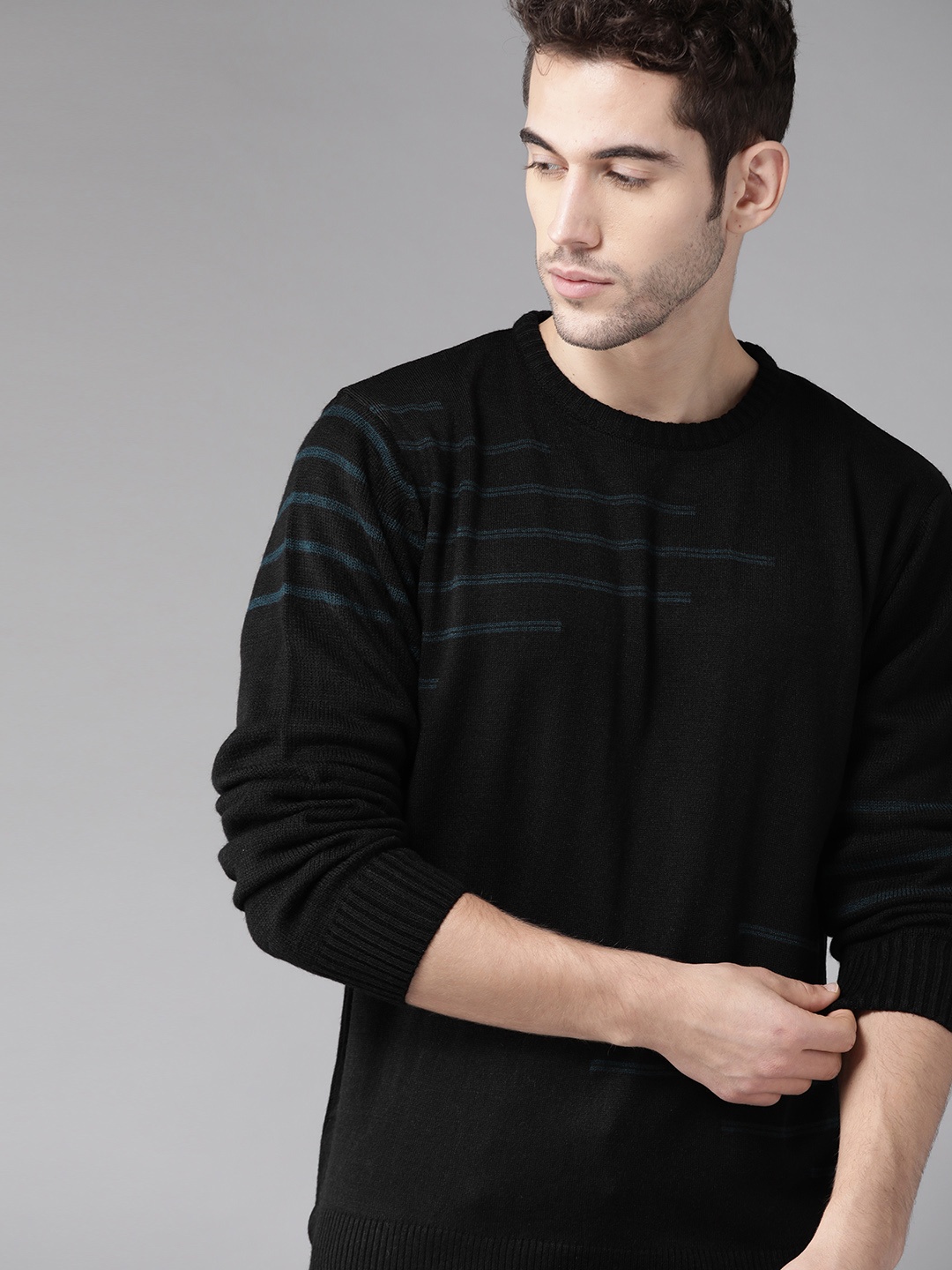 

Roadster Men Black & Teal Blue Self Design Pullover Sweater