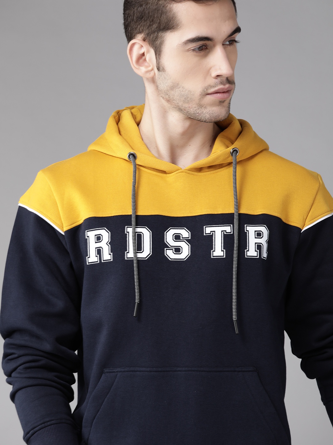 

Roadster Men Navy Blue & Mustard Yellow Colourblocked Hooded Sweatshirt