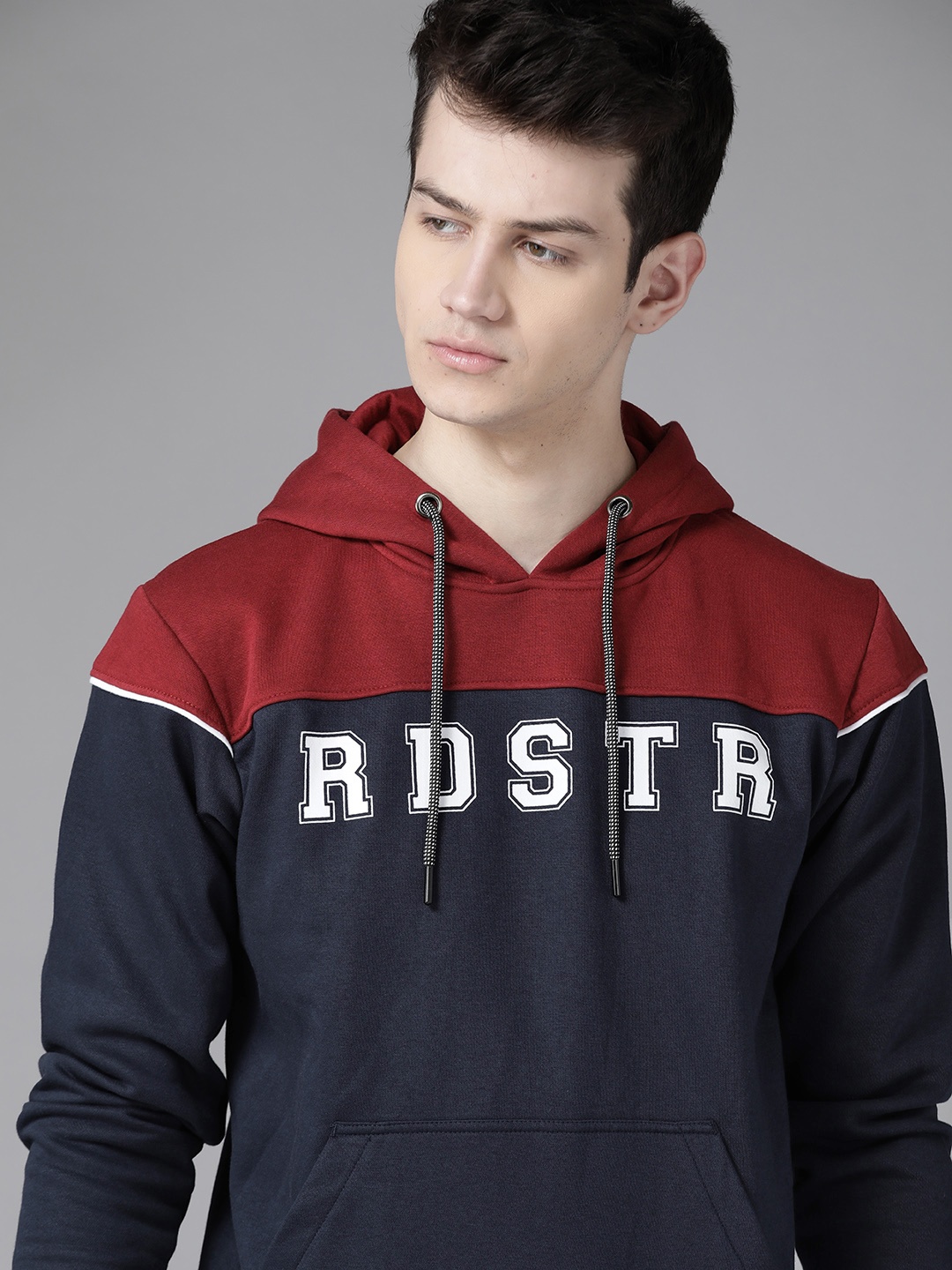 

Roadster Men Navy Blue & Maroon Colourblocked Hooded Sweatshirt