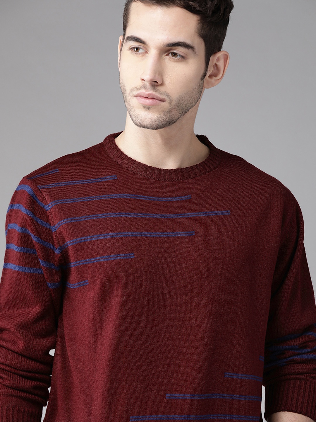 

Roadster Men Burgundy & Blue Striped Pullover Sweater