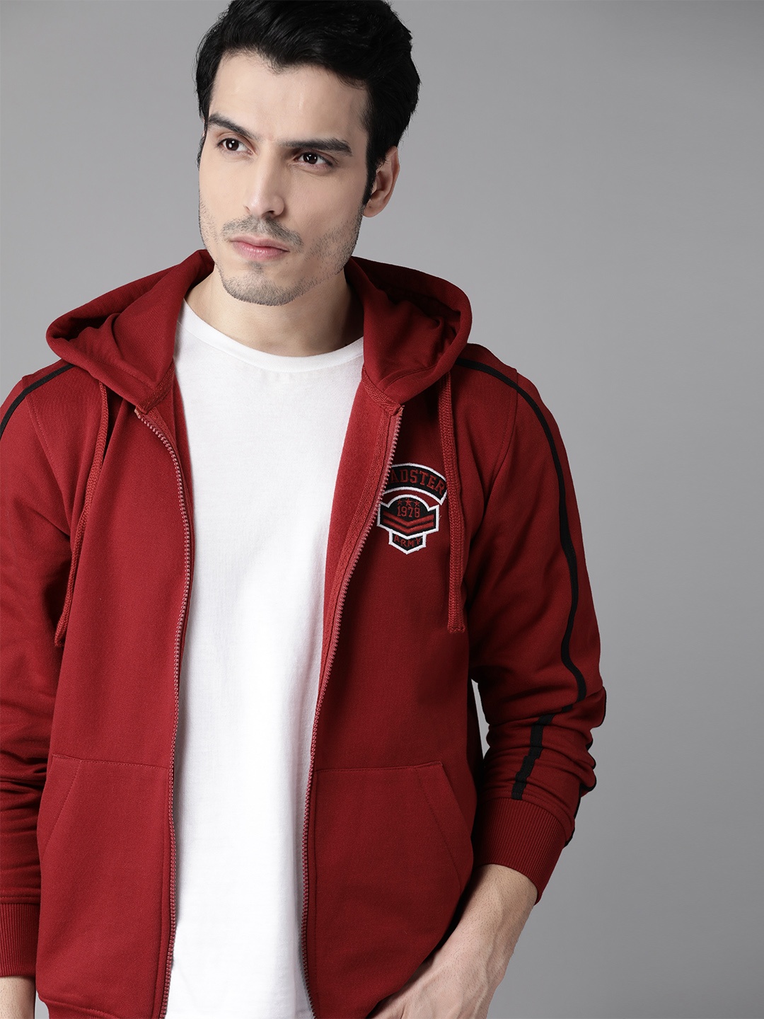 

Roadster Men Red Solid Hooded Sweatshirt