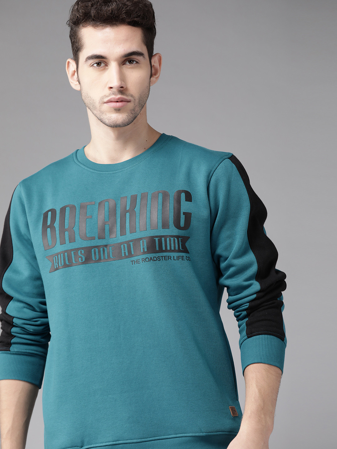 

Roadster Men Teal Blue & Black Printed Sweatshirt