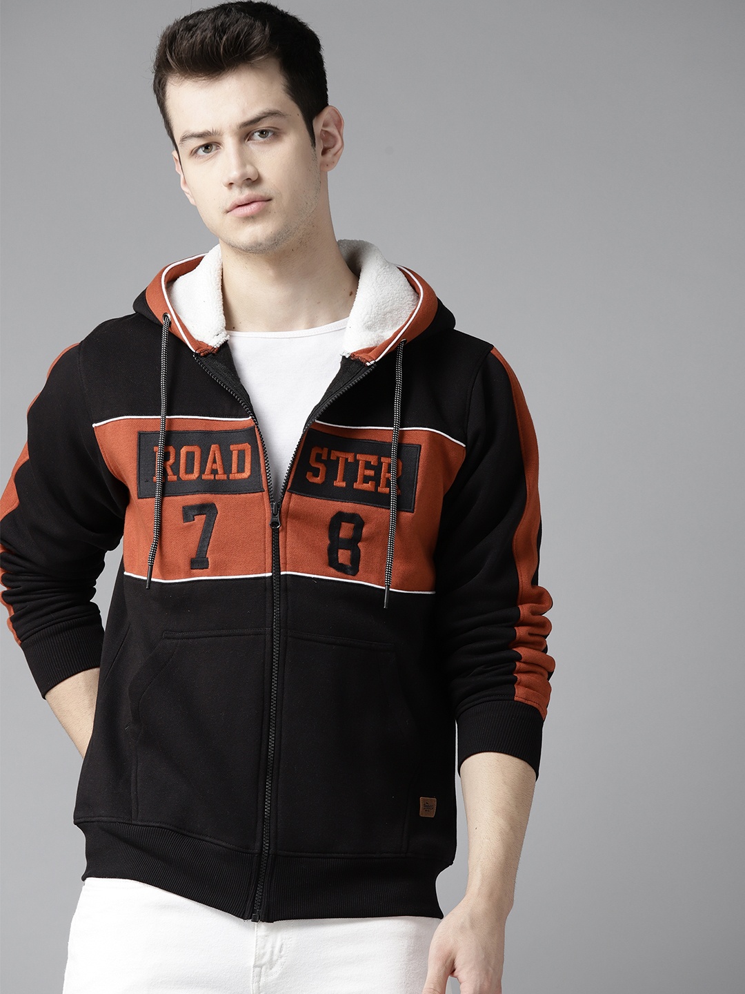 

Roadster Men Black & Rust Orange Colourblocked Hooded Sweatshirt