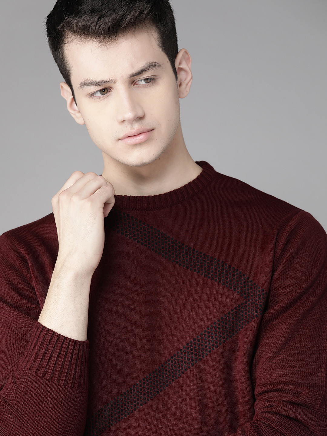 

Roadster Men Burgundy & Black Self Design Pullover Sweater