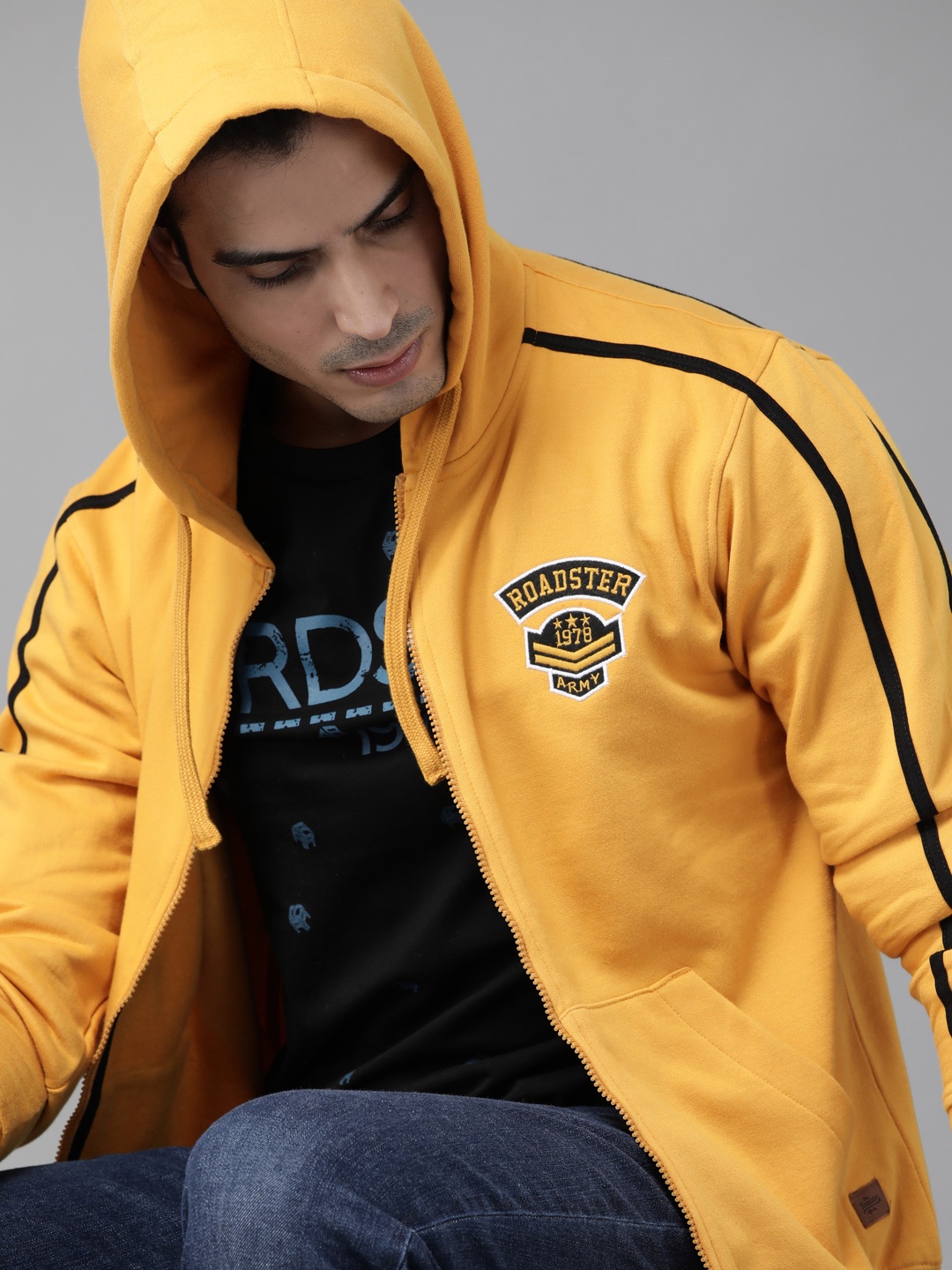 

Roadster Men Yellow Solid Hooded Sweatshirt with Striped Detail