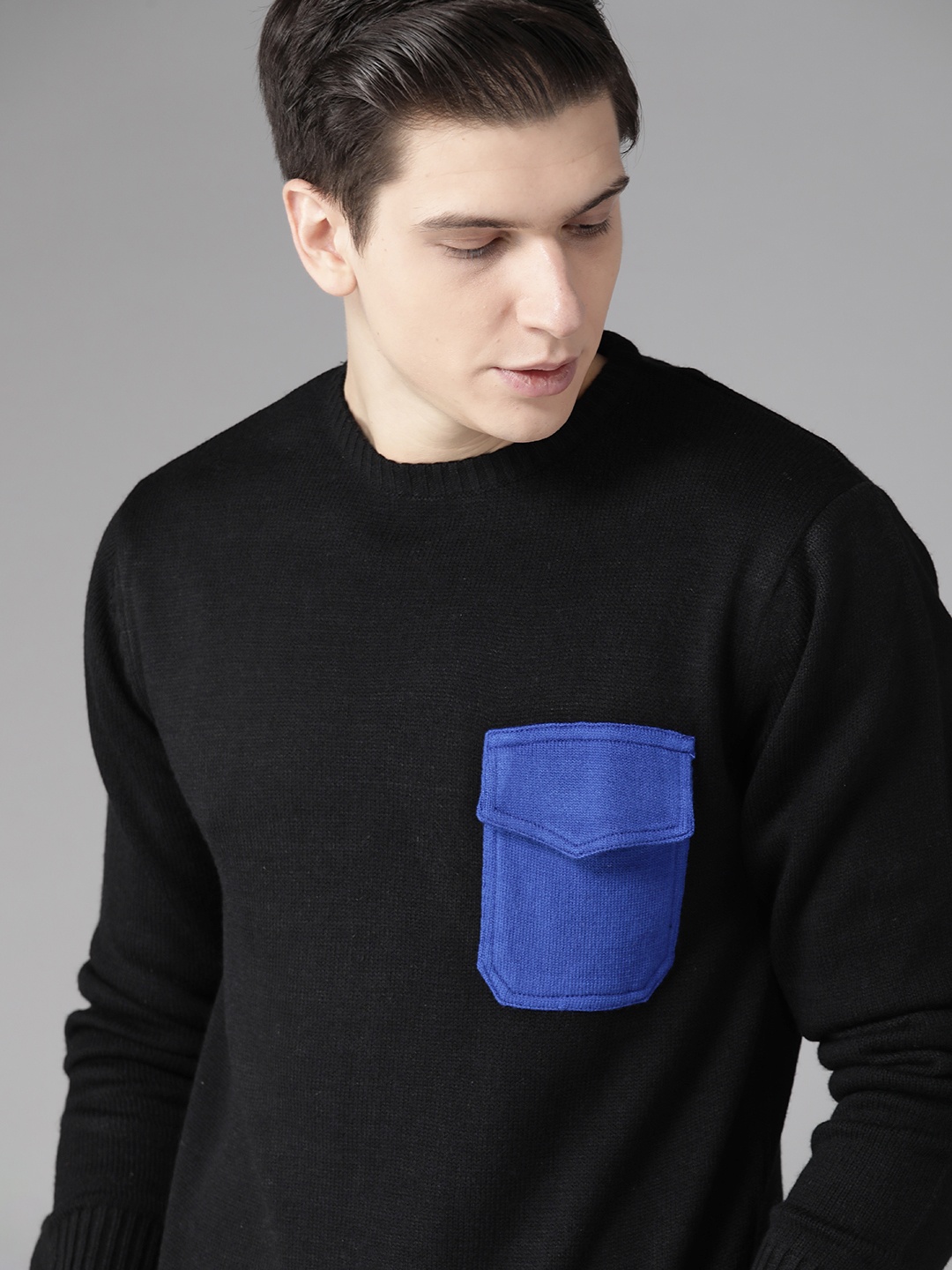 

Roadster Men Black Solid Acrylic Sweater