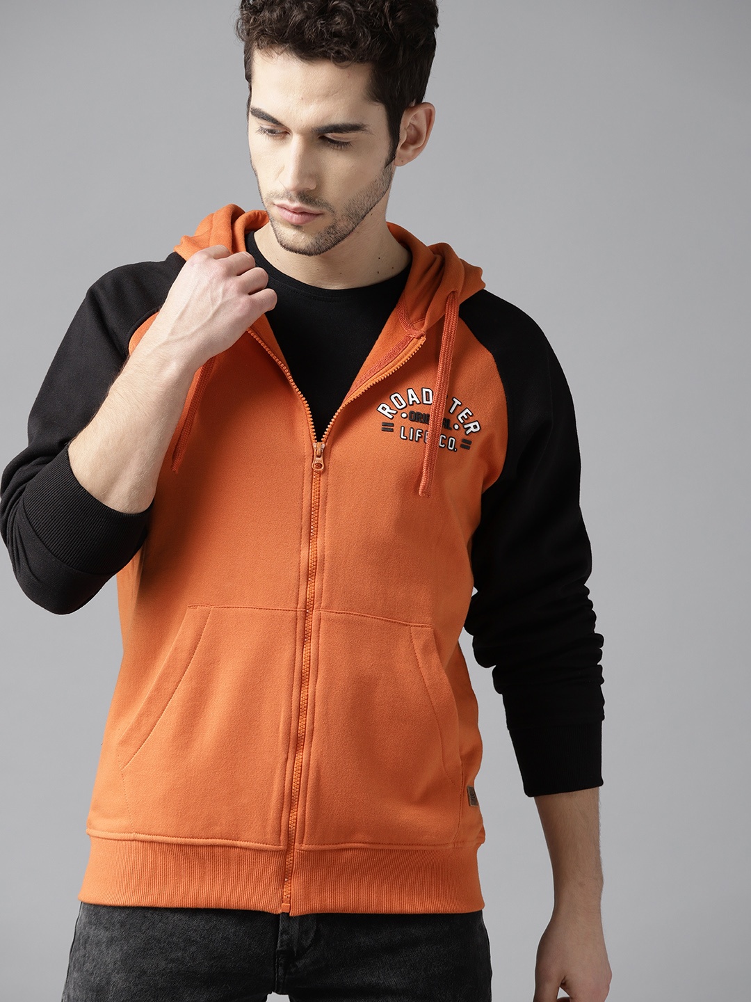 

Roadster Men Rust Orange Solid Hooded Sweatshirt