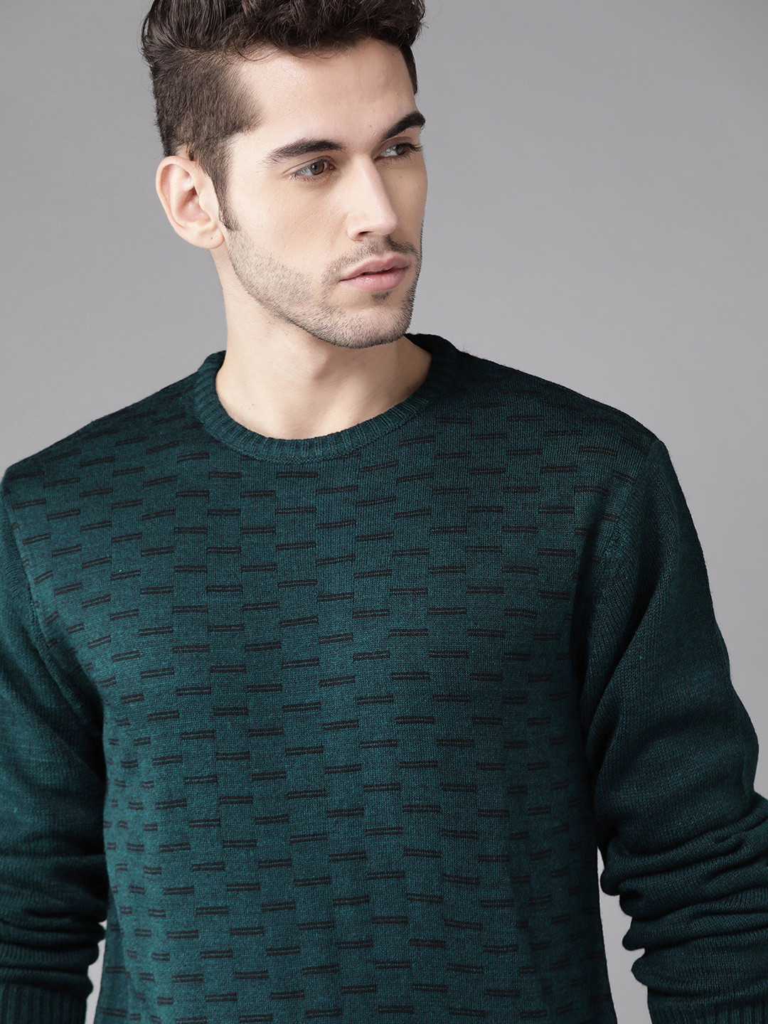 

Roadster Men Teal Blue & Black Self Design Pullover Sweater