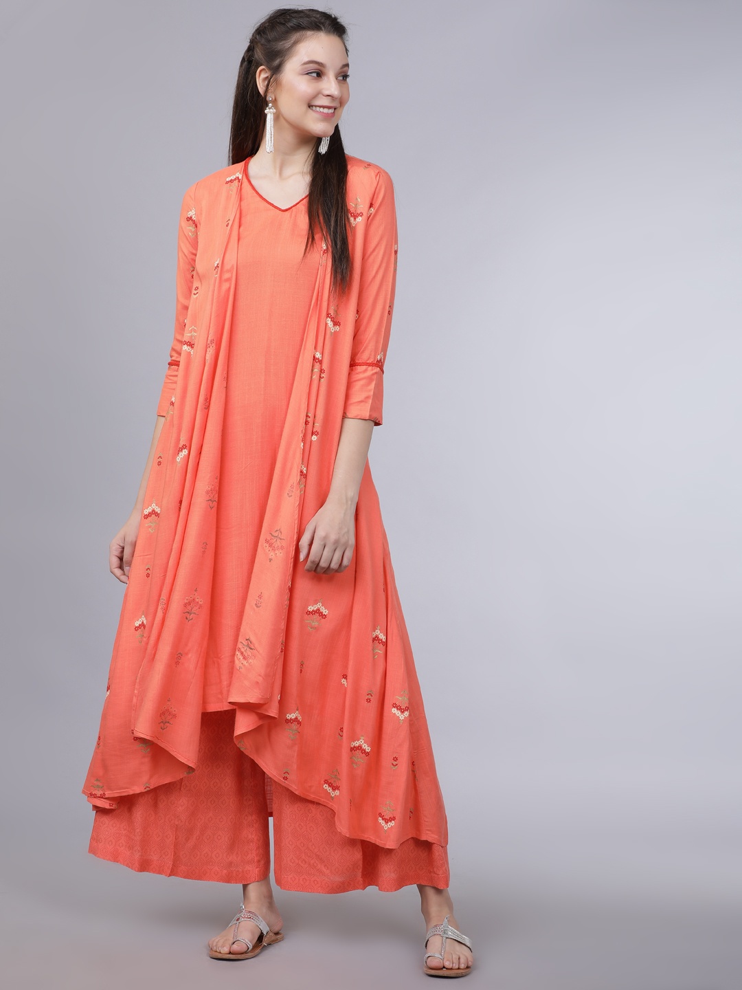 

Vishudh Women Coral Orange Embroidered Kurta with Palazzos