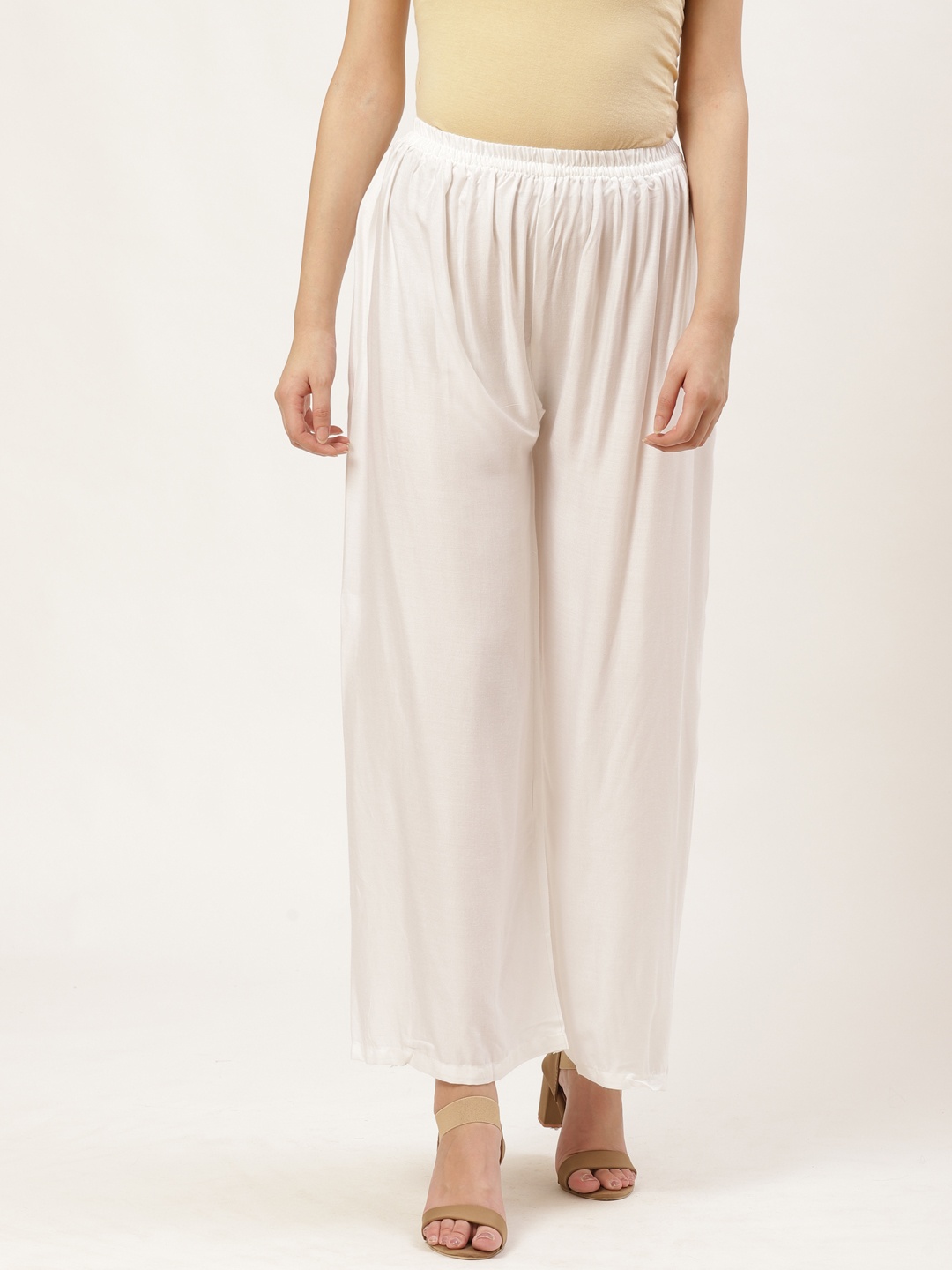 

Vastraa Fusion Women White Semi Sheer Solid Flared Palazzos