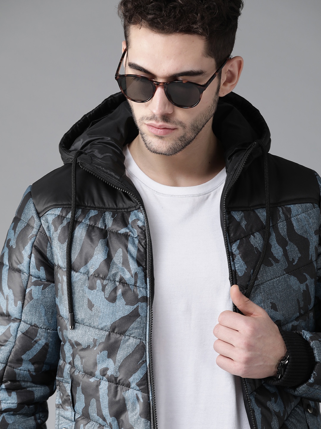 

Roadster Men Black & Teal Blue Printed Hooded Bomber Jacket