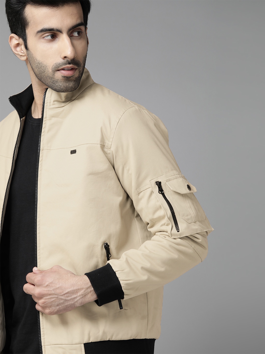 

Roadster Men Beige Solid Bomber Jacket