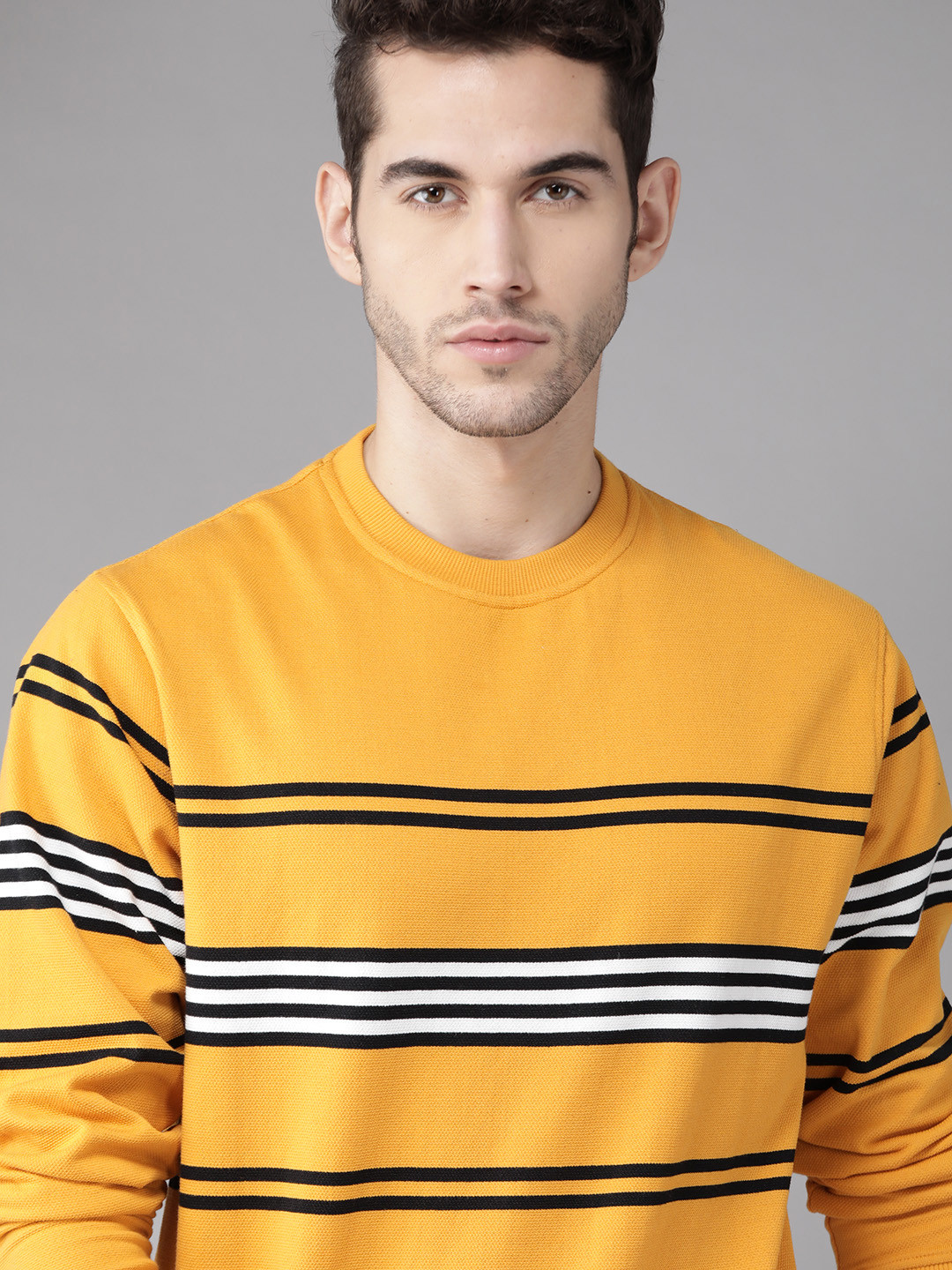 

Roadster Men Yellow & Black Striped Sweatshirt