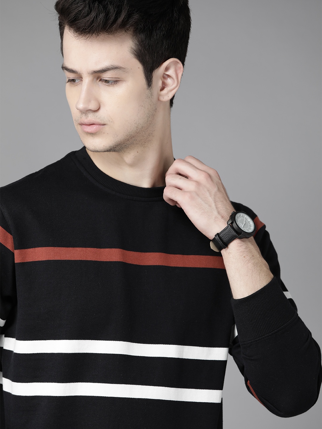 

Roadster Men Black & Red Striped Sweatshirt