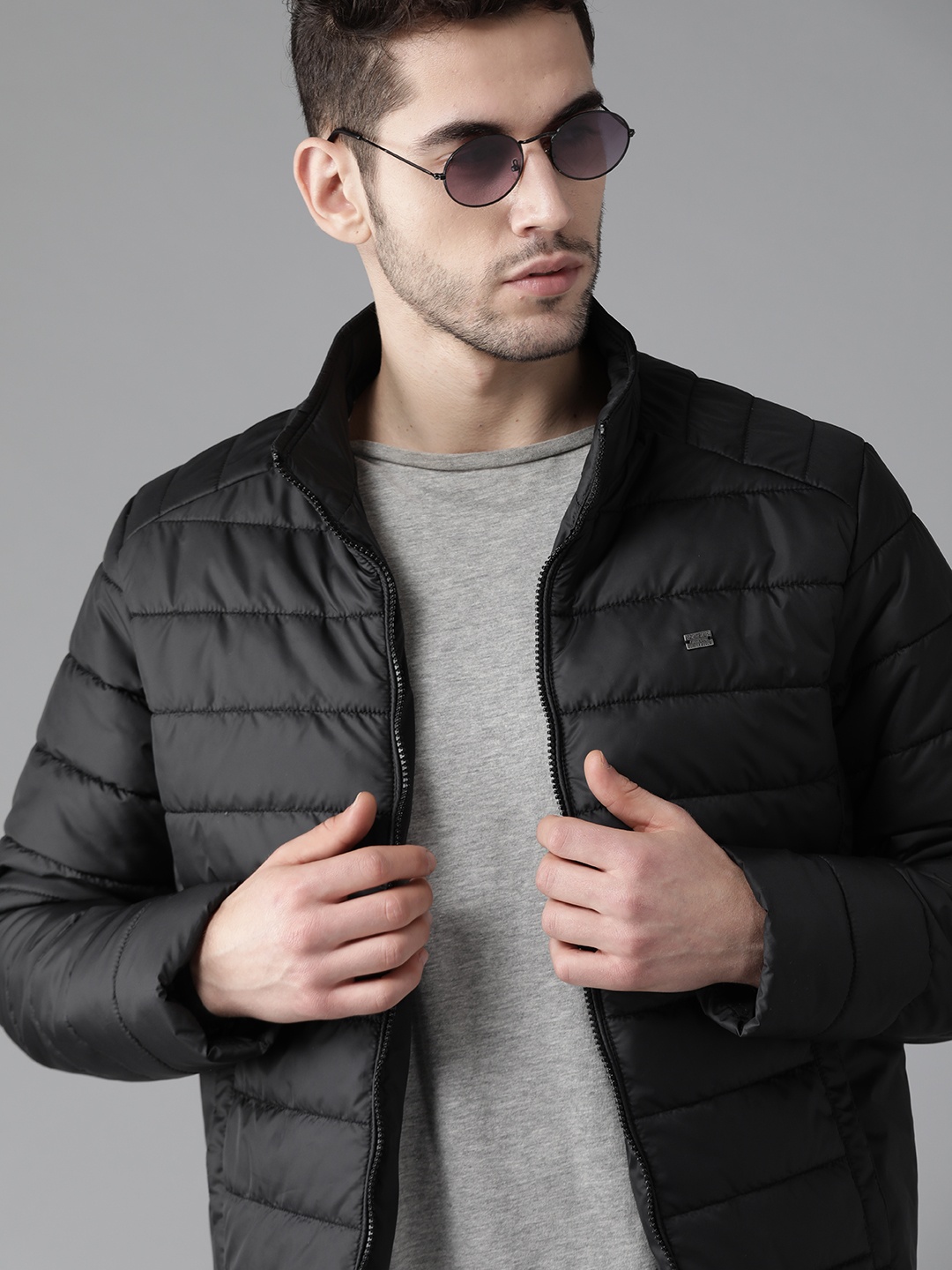 

Roadster Men Black Solid Padded Jacket