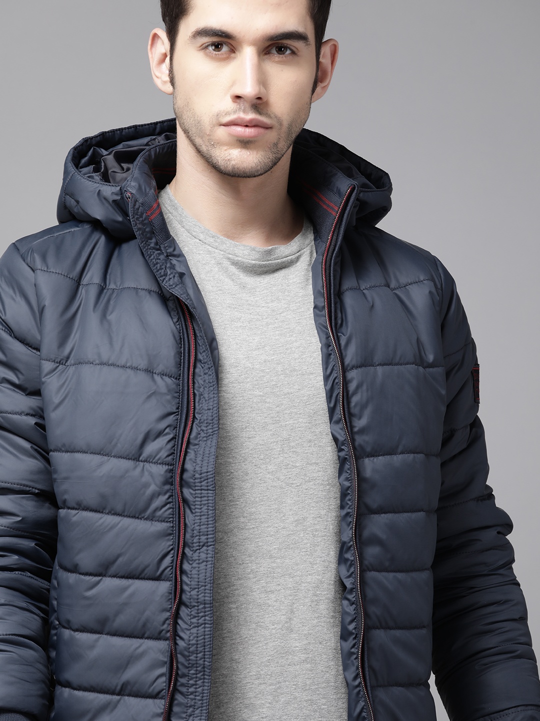 

Roadster Men Navy Blue Solid Detachable Hooded Padded Jacket