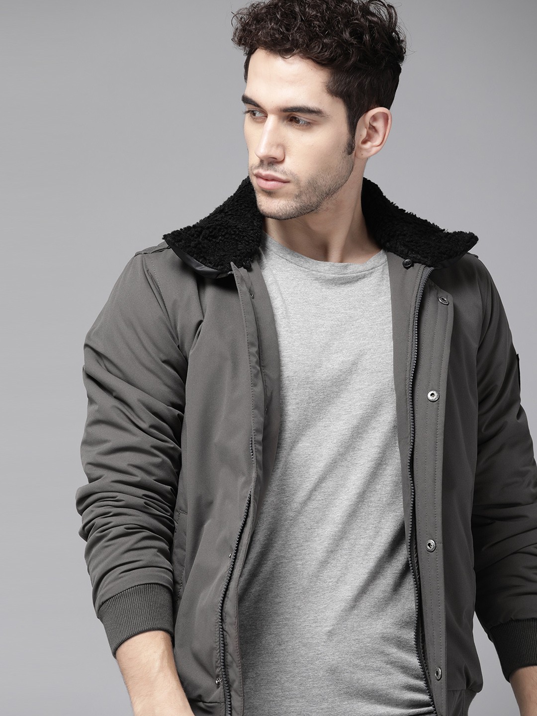 

Roadster Men Charcoal Grey Solid Padded Jacket