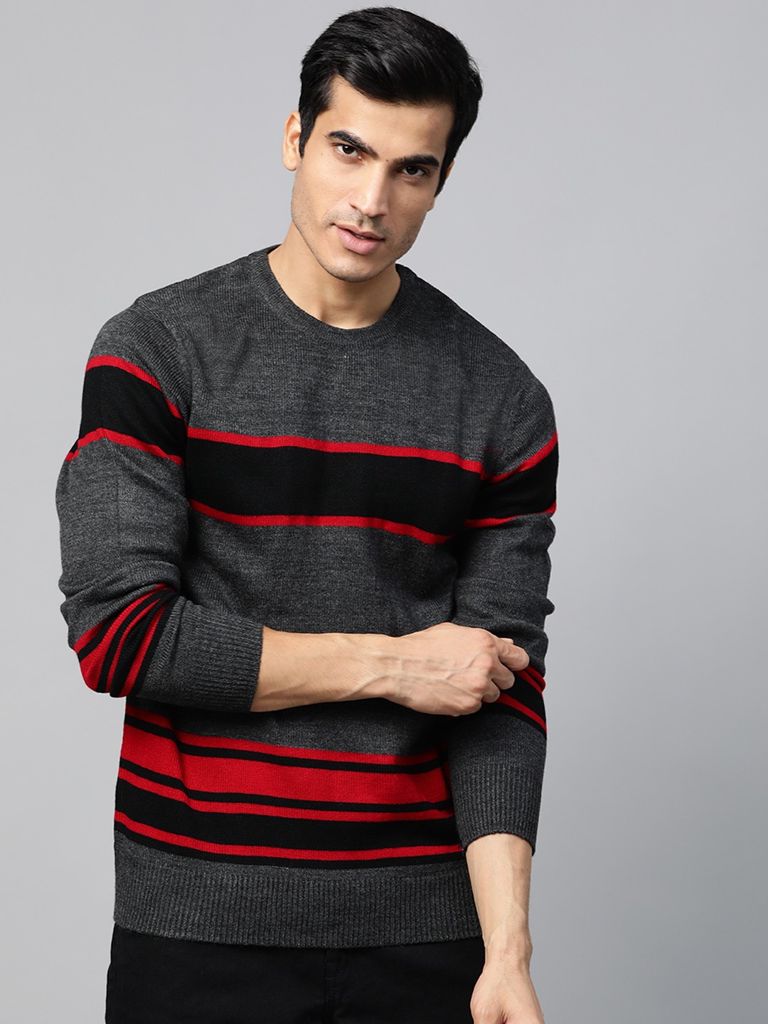 

Roadster Men Charcoal Grey & Red Striped Pullover Sweater
