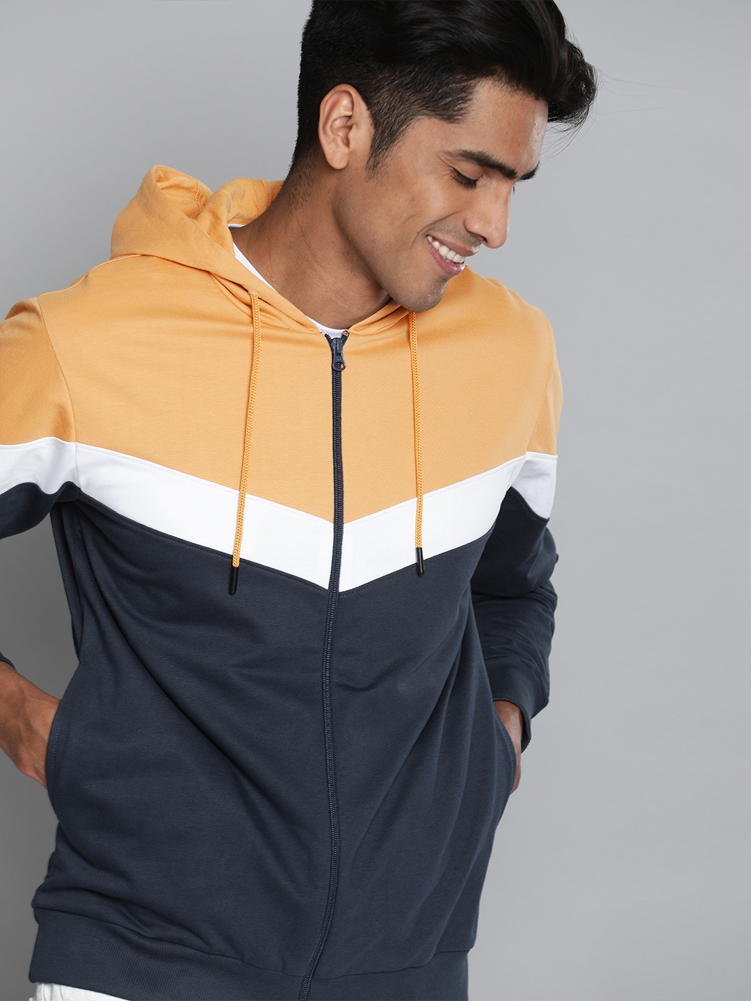 

Mast & Harbour Men Yellow & Navy Blue Colourblocked Hooded Sweatshirt