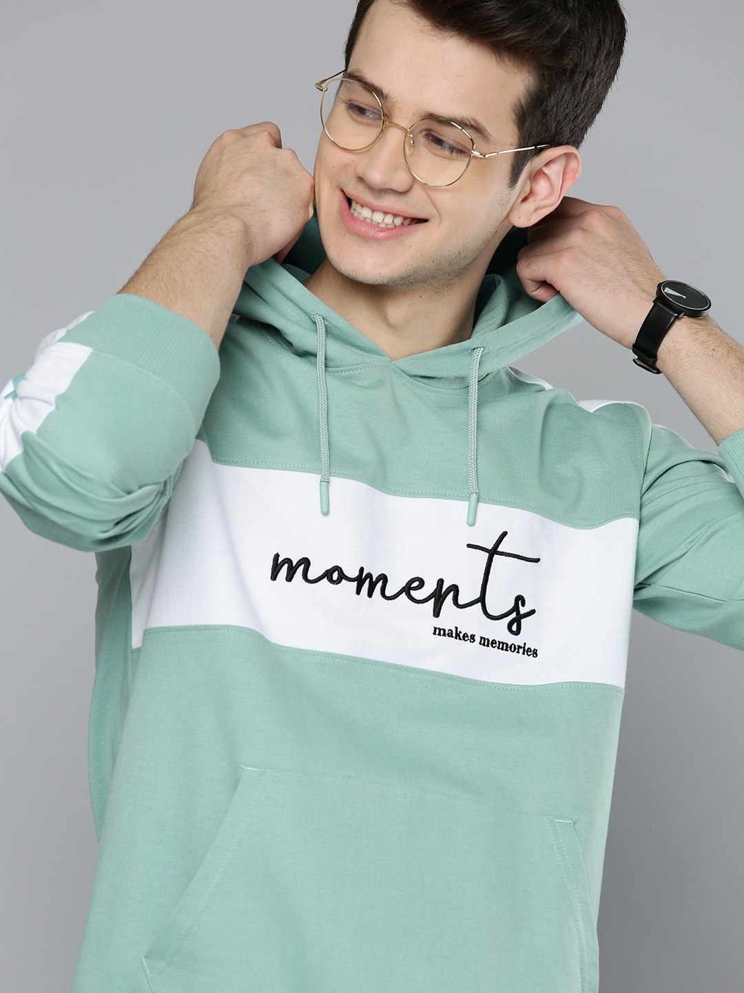 

Mast & Harbour Men Sea Green & White Colourblocked Hooded Sweatshirt