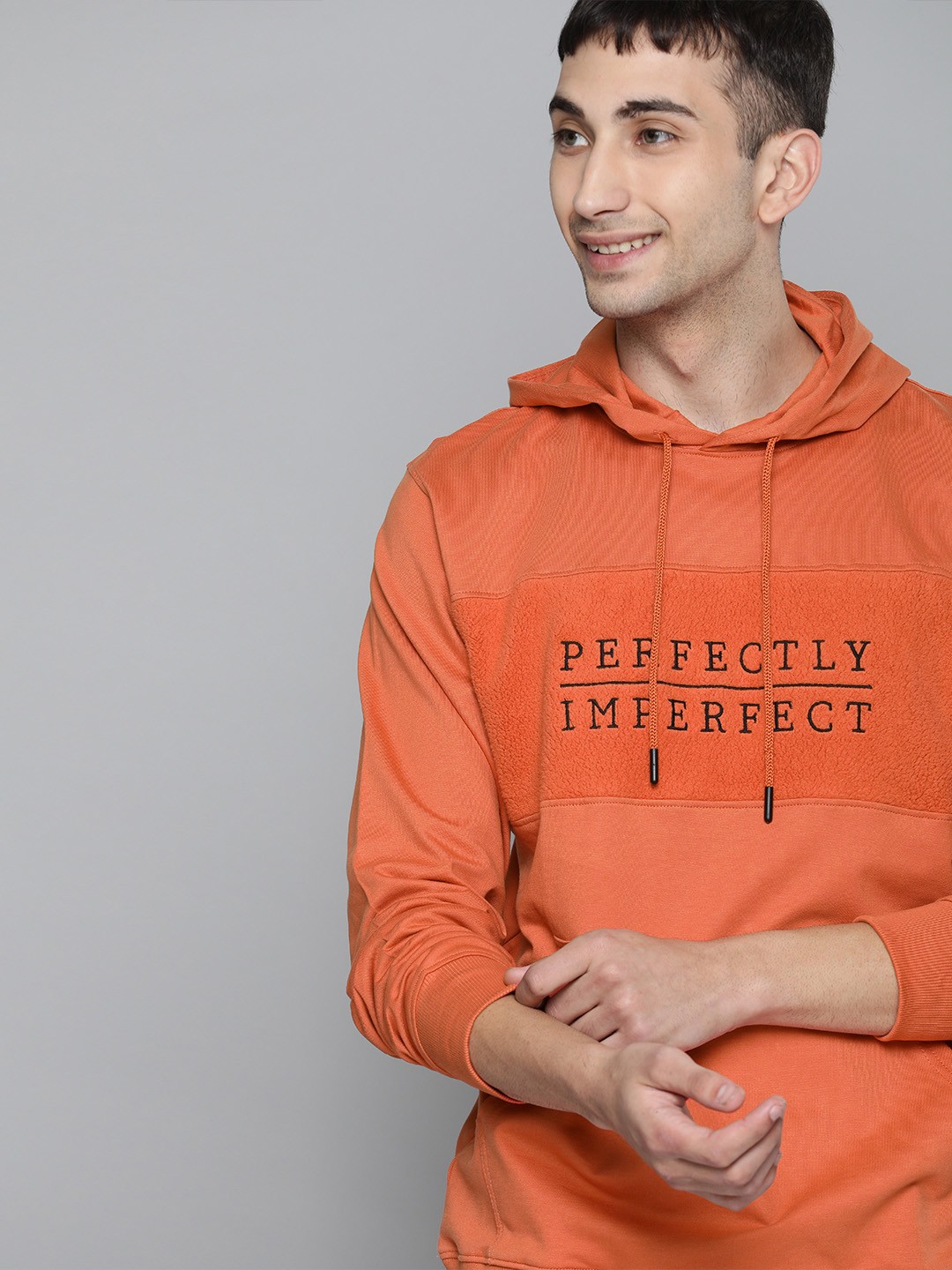 

Mast & Harbour Men Orange Printed Hooded Sweatshirt