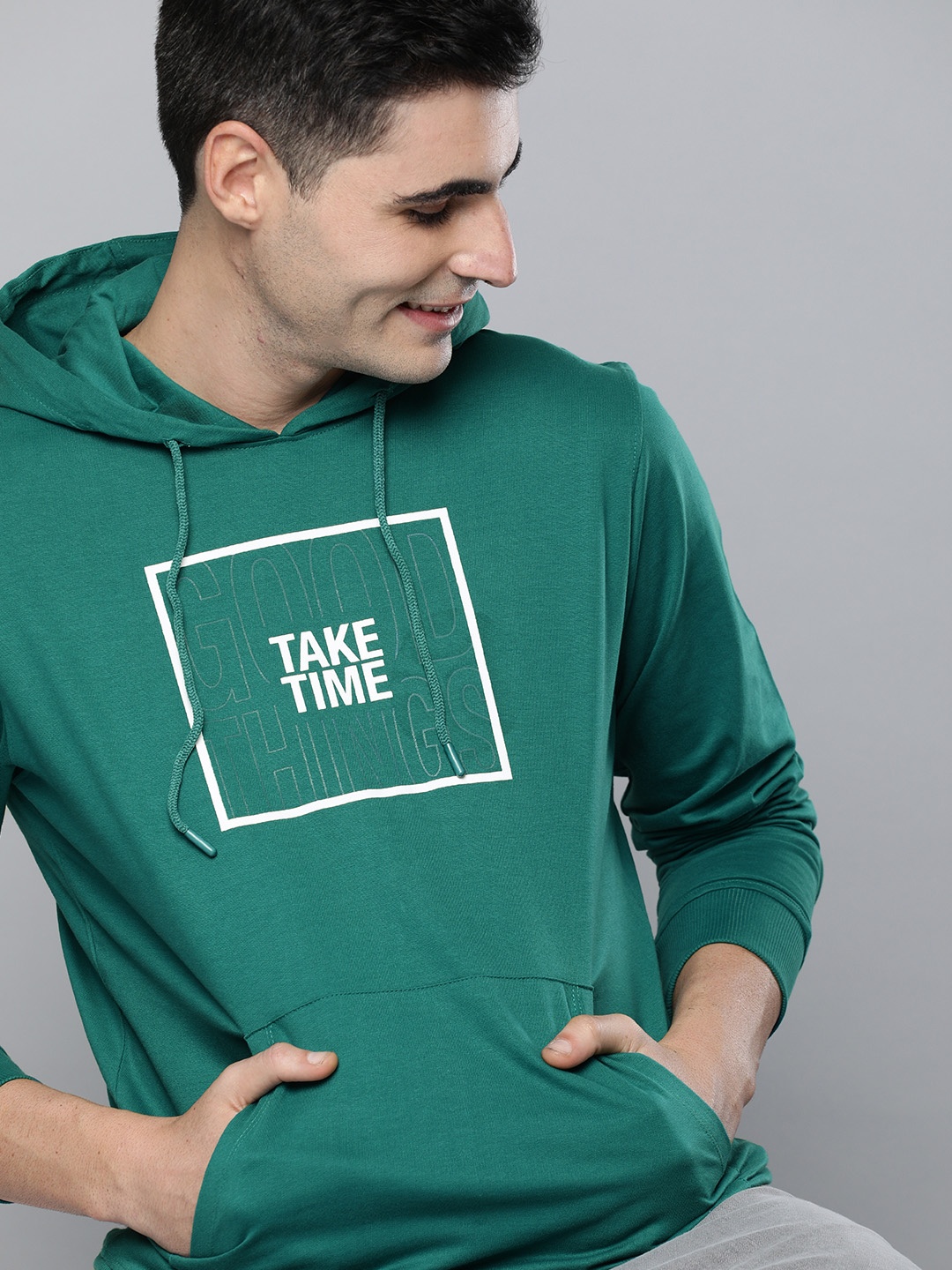 

Mast & Harbour Men Green Printed Hooded Sweatshirt