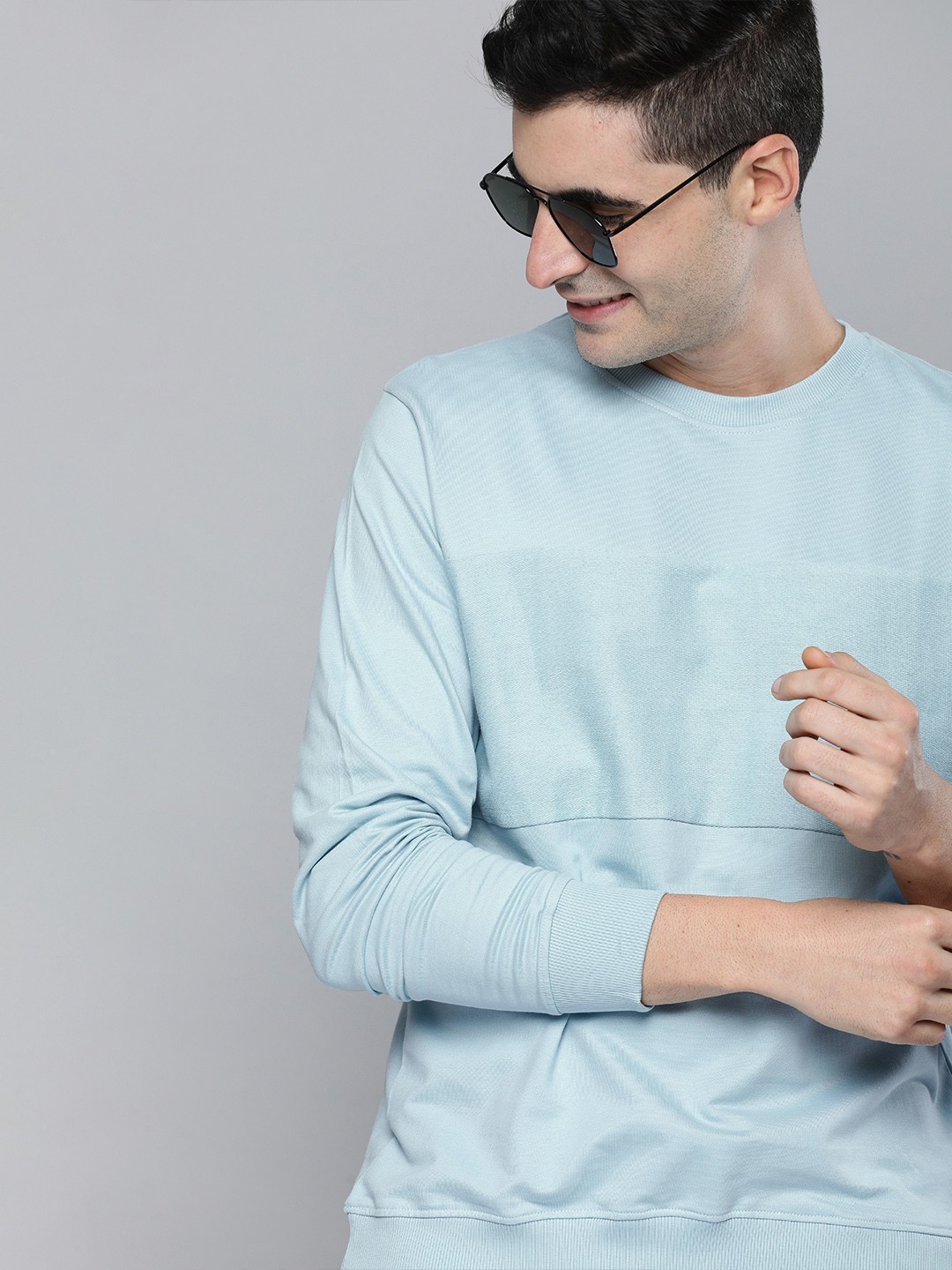 

Mast & Harbour Men Blue Solid Sweatshirt