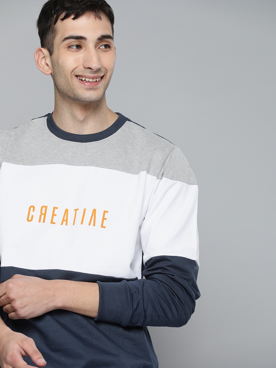 

Mast & Harbour Men White & Navy Blue Colourblocked Sweatshirt