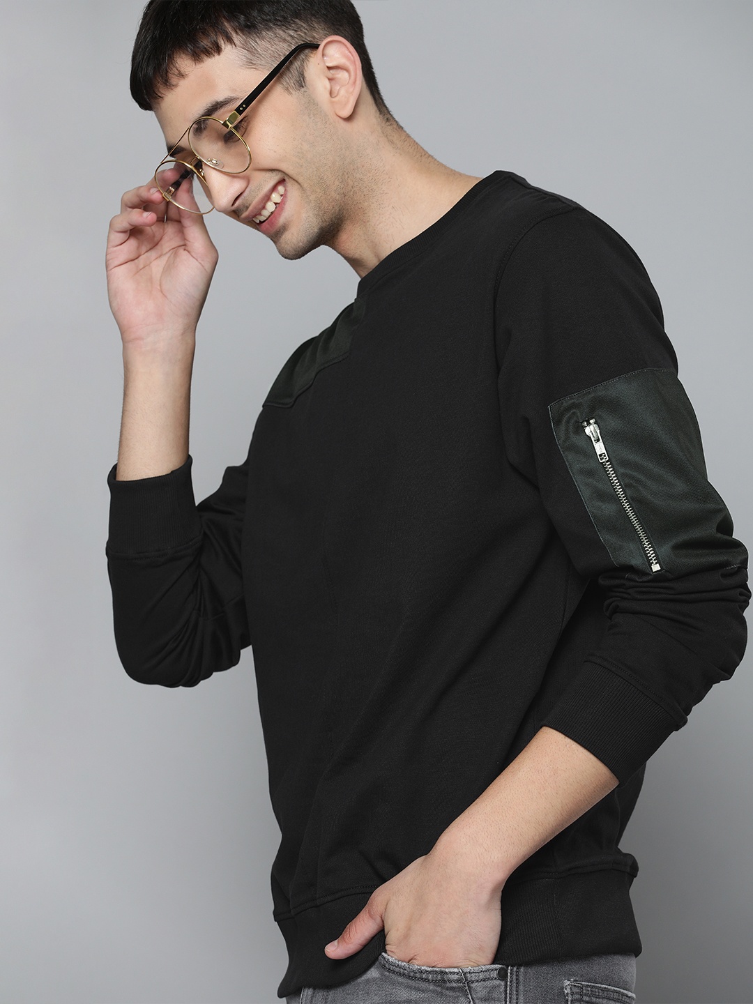 

Mast & Harbour Men Black Solid Sweatshirt
