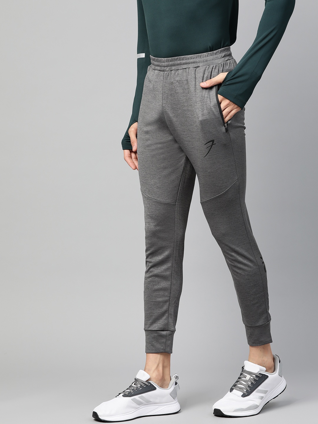 

FUAARK Men Charcoal Grey Slim Fit Self Design Training Joggers