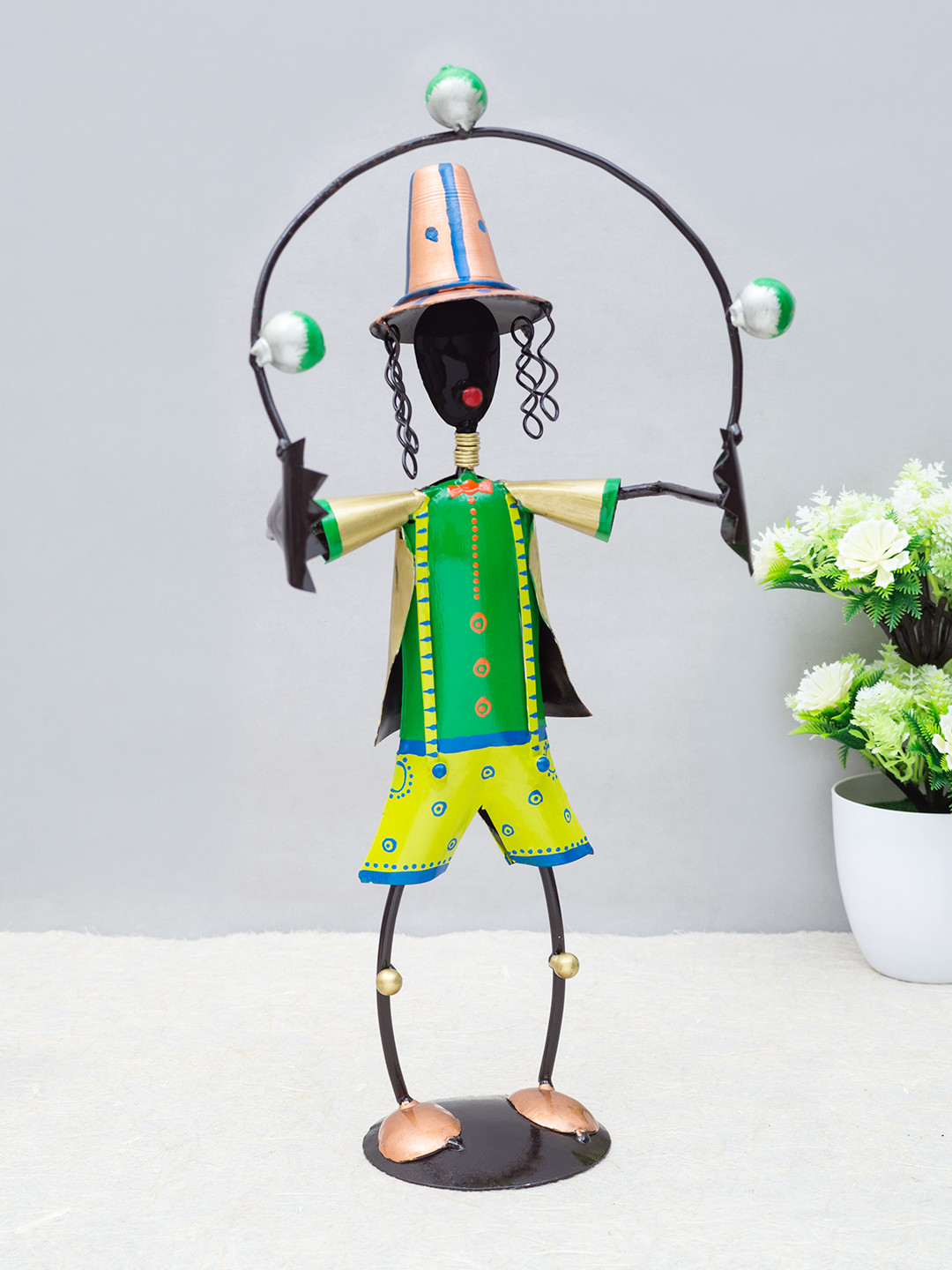 

Golden Peacock Green & Black Handcrafted Circus Joker Man Figurine Showpiece